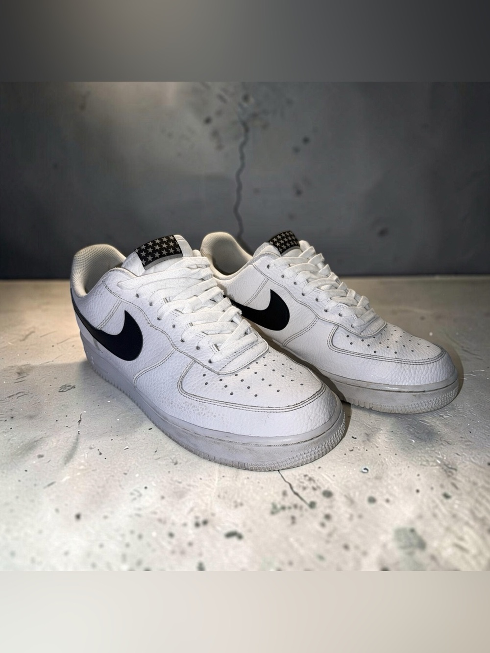 Nike White Low-Top Sneakers with Black Swoosh